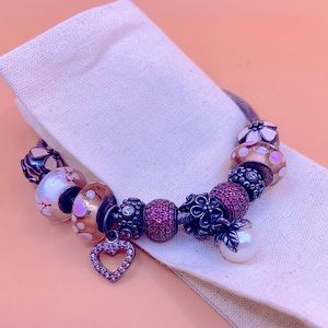 Authentic Pandora bracelet with 10 charms.